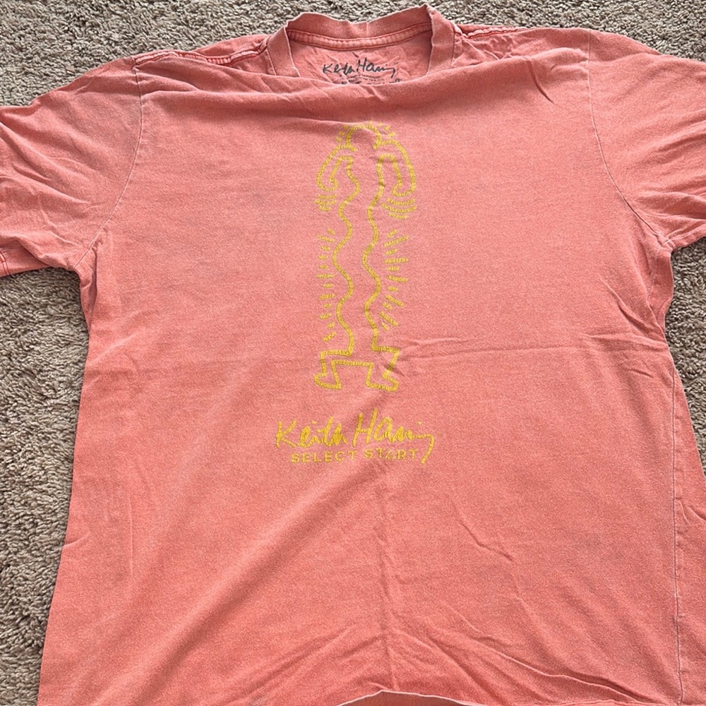 Vibrant Orange Short Sleeve Tee with Graphic Design